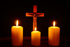 crucifix-three-burning-candles